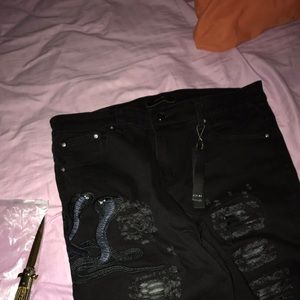 Amiri black snake design jeans
